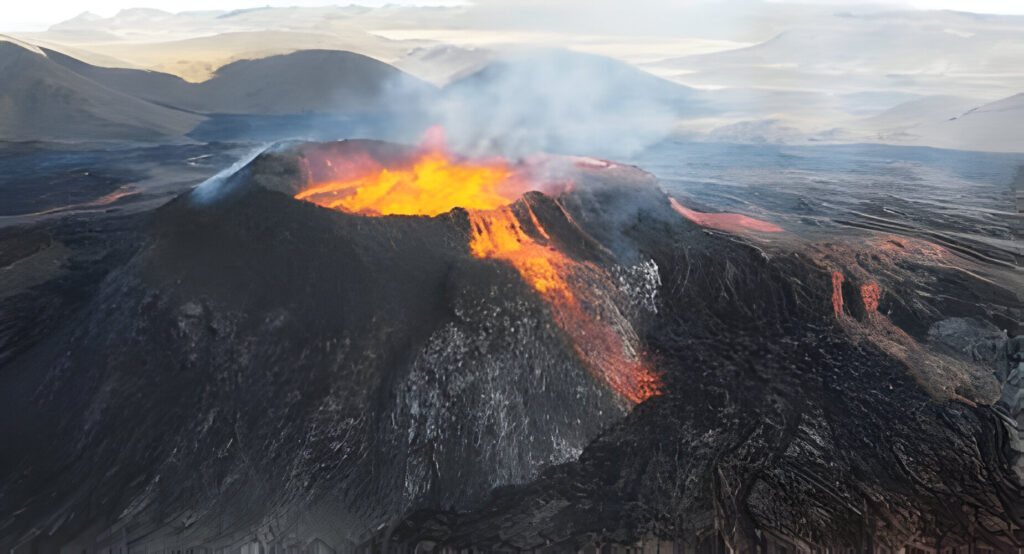 Volcano in Hawaii with smoke and a hazy sky