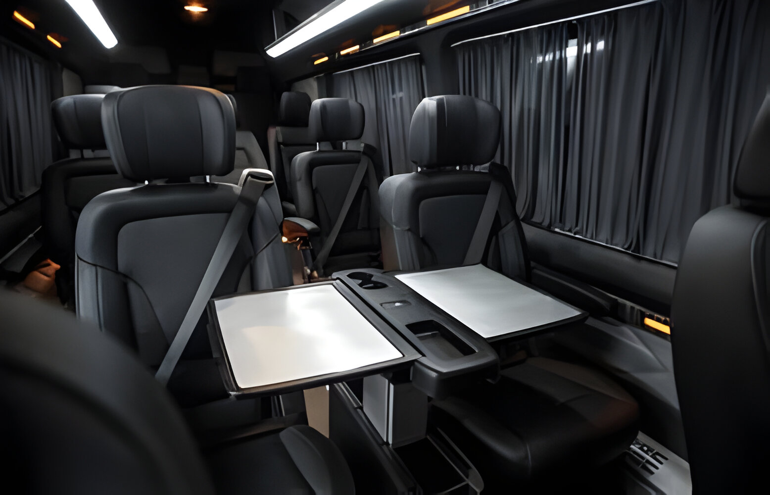 comfortable passenger bus interior with upholstered seats; individual transfer for a group of people