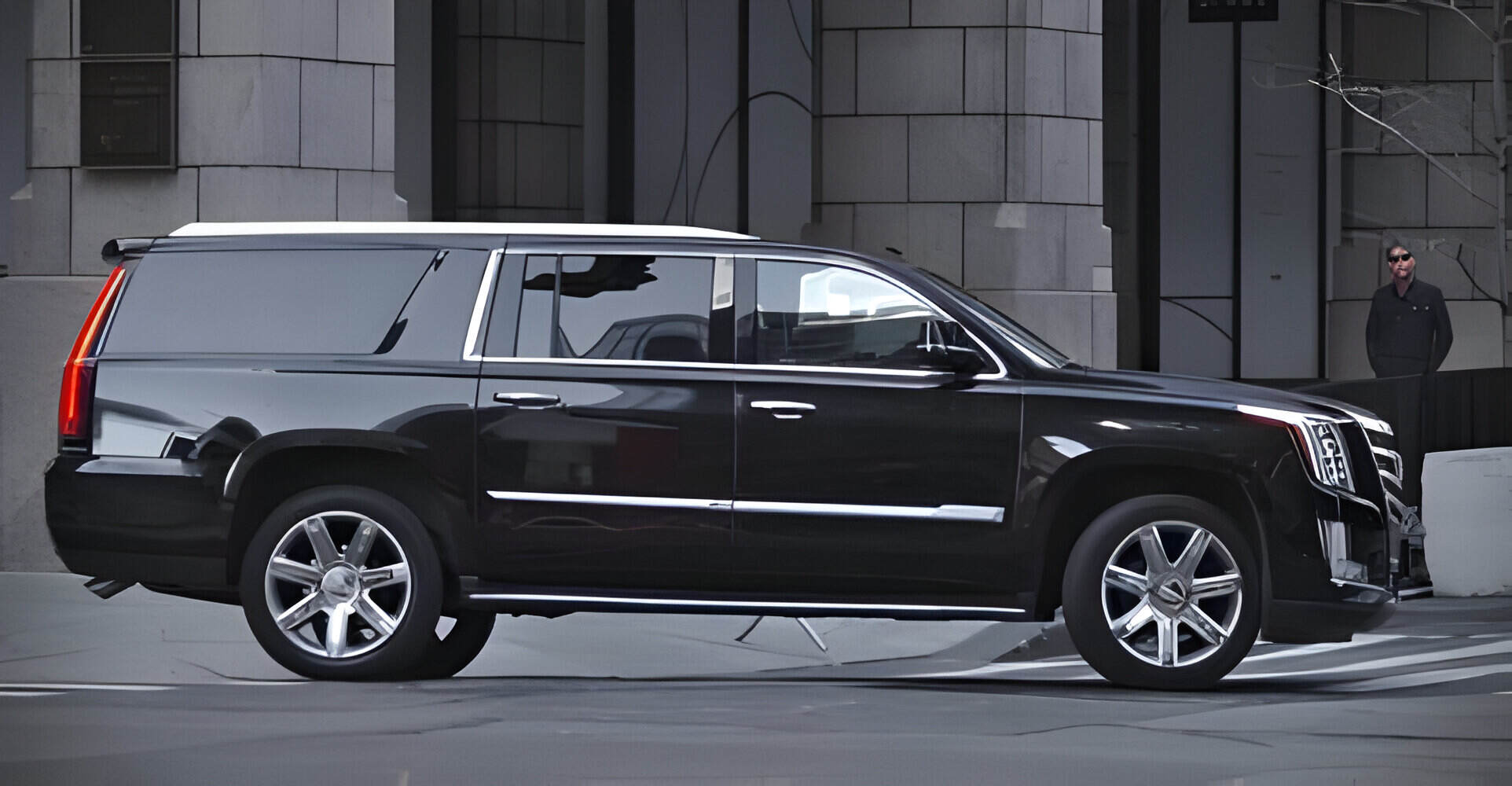 Black and shiny luxury SUV, Cadillac Escalade on the street