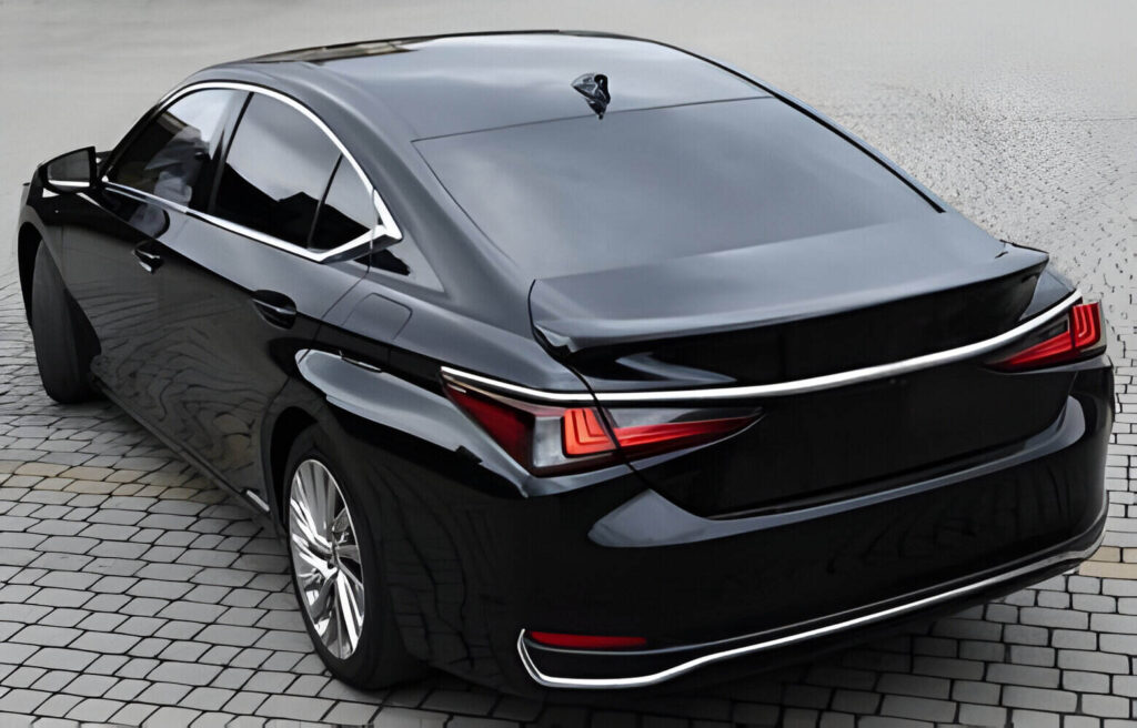 Black hybrid sedan car standing in a road