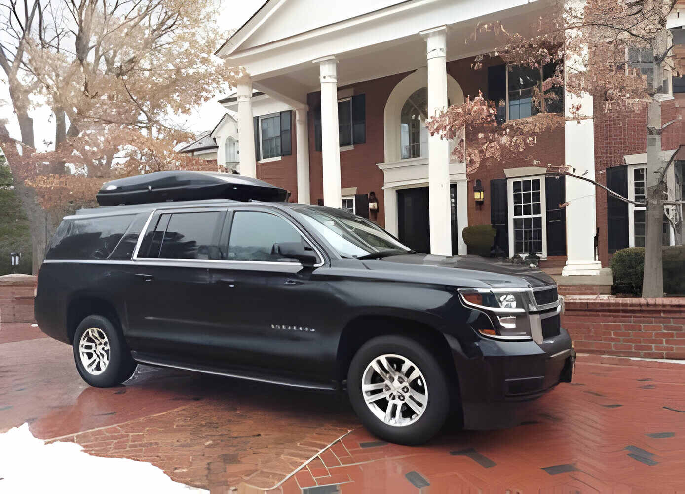 Chevrolet Suburban parked by a private residence