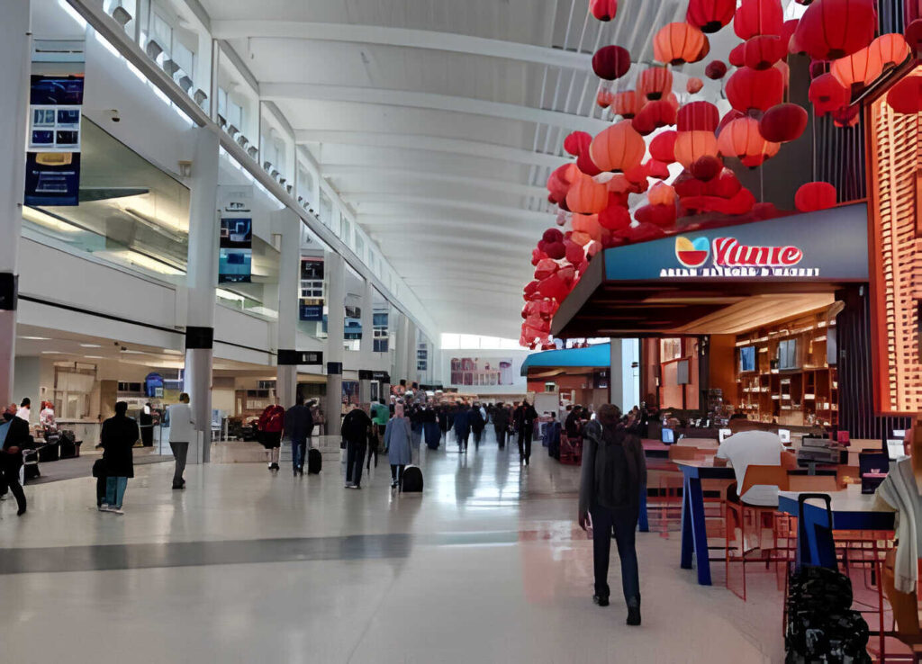 Passengers walking inside George Bush Intercontinental Airport (IAH)