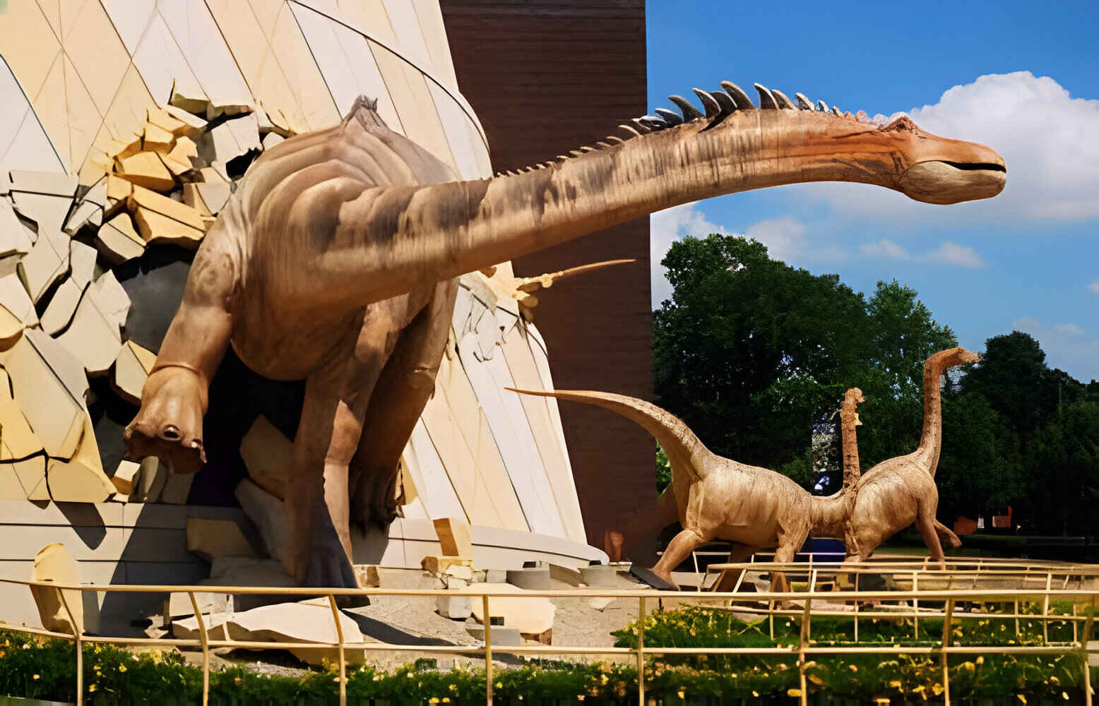 A dinosaur "breaks out" of the wall at the Indianapolis Children's Museum in Indianapolis, Indiana