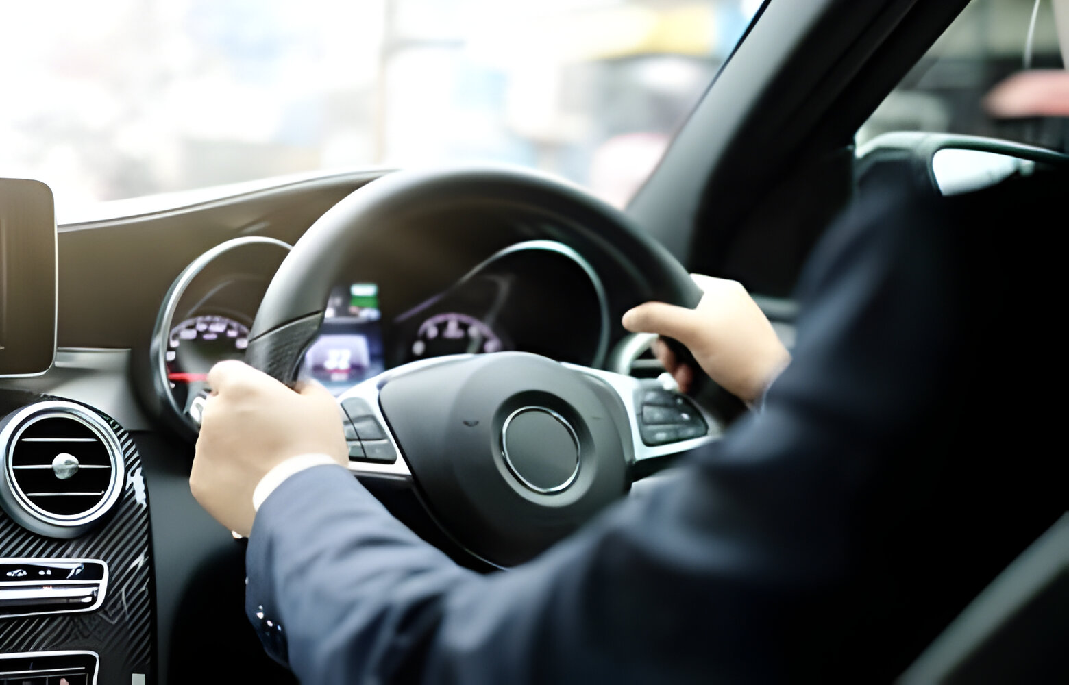 Chauffeur Driving Luxury Car with Suit Uniform