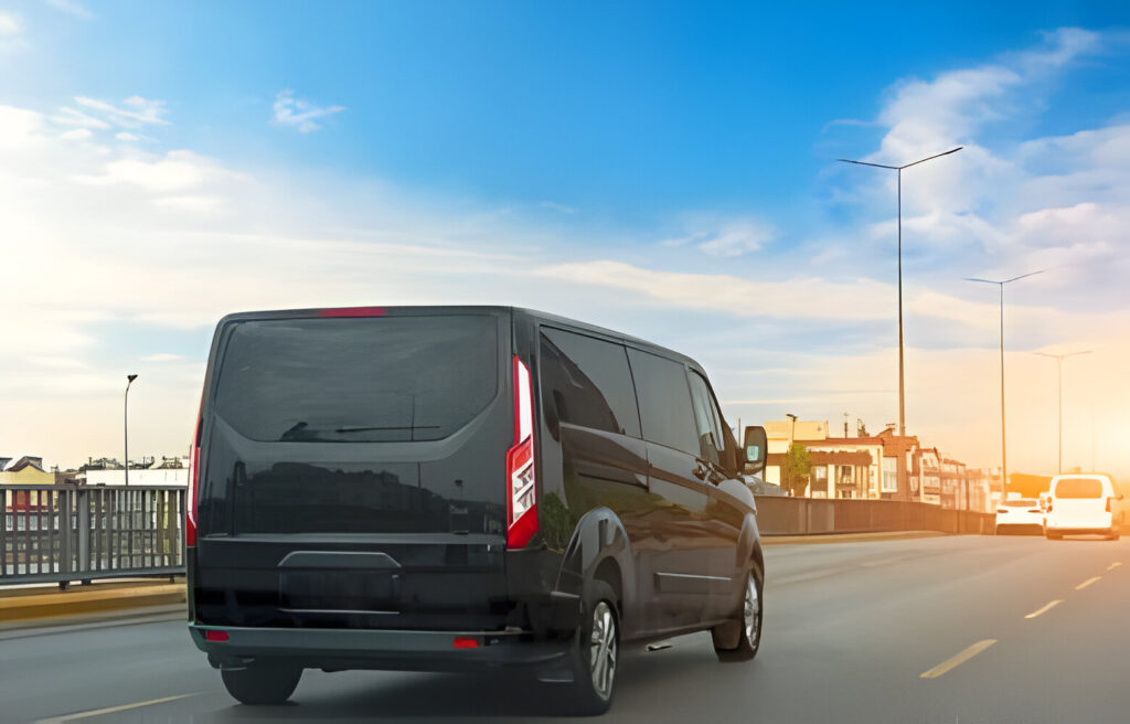 Black modern passenger charter van