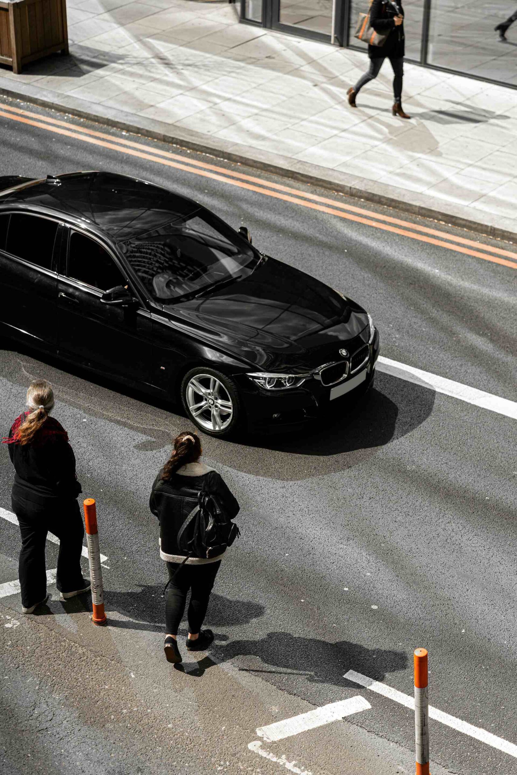 Black Luxury Car on Road