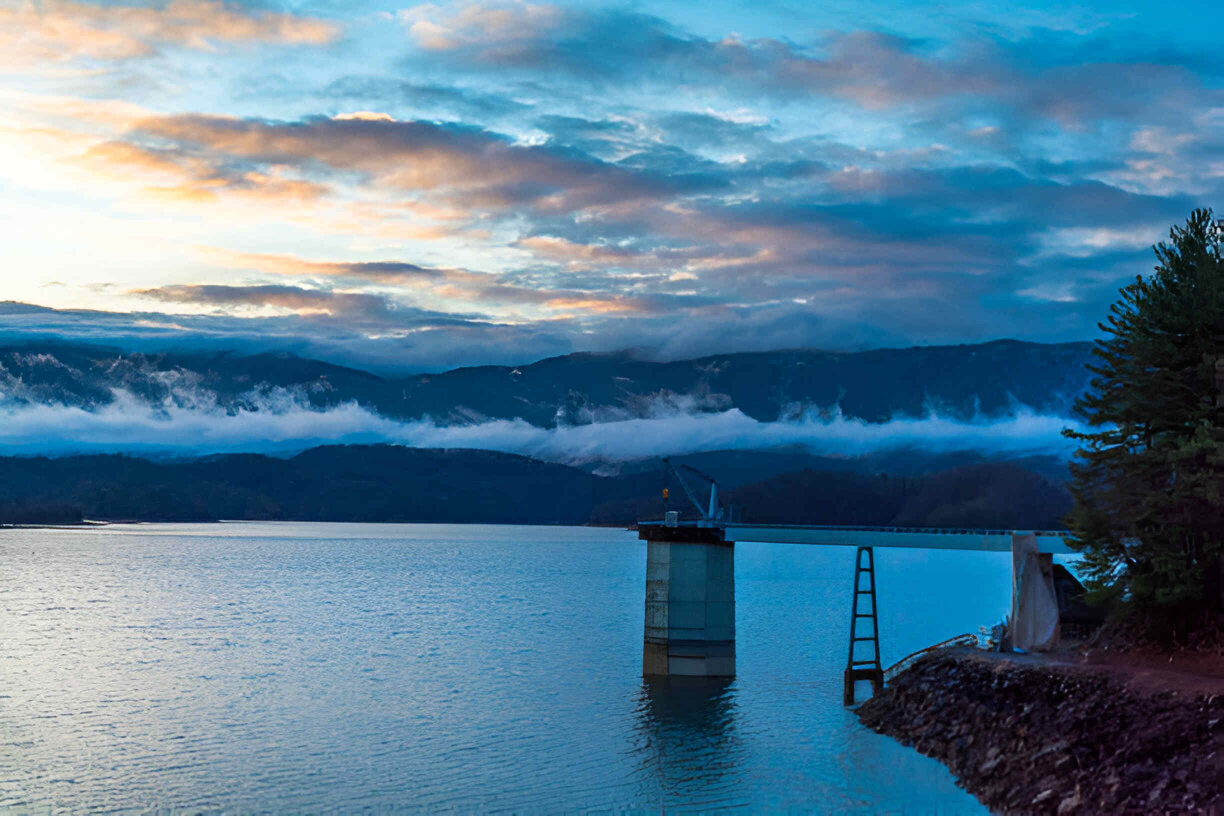 Thick fog rolled over the Blue Ridge Mountains as a storm system moved out at sunrise along South Holston Lake in Britol,