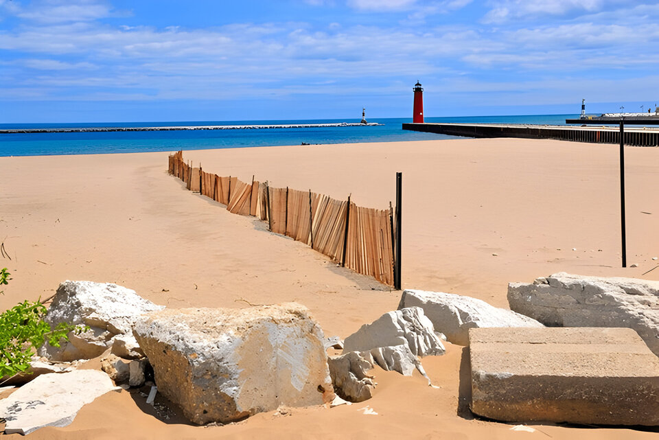 Fence errected to prevent sand and soil erosion on the beach on Lake Michigan at Kenosha Wisconsin WI