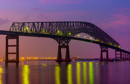 Francis Scott Key Bridge and Baltimore skyline at night