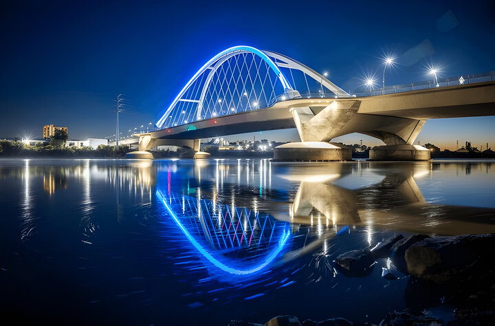 The Lowry Bridge in Minneapolis, Minnesota lit up at night.