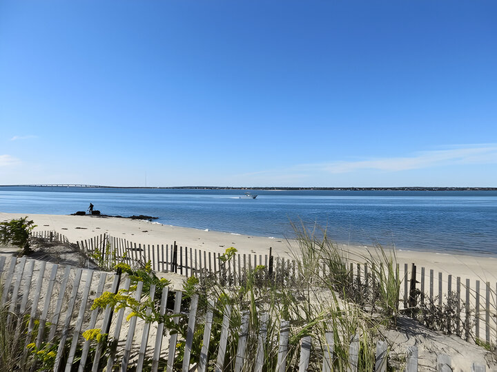 Clear blue sky over Shinnecock Bay at Shinnecock East County Park in Southampton, Long Island, New York