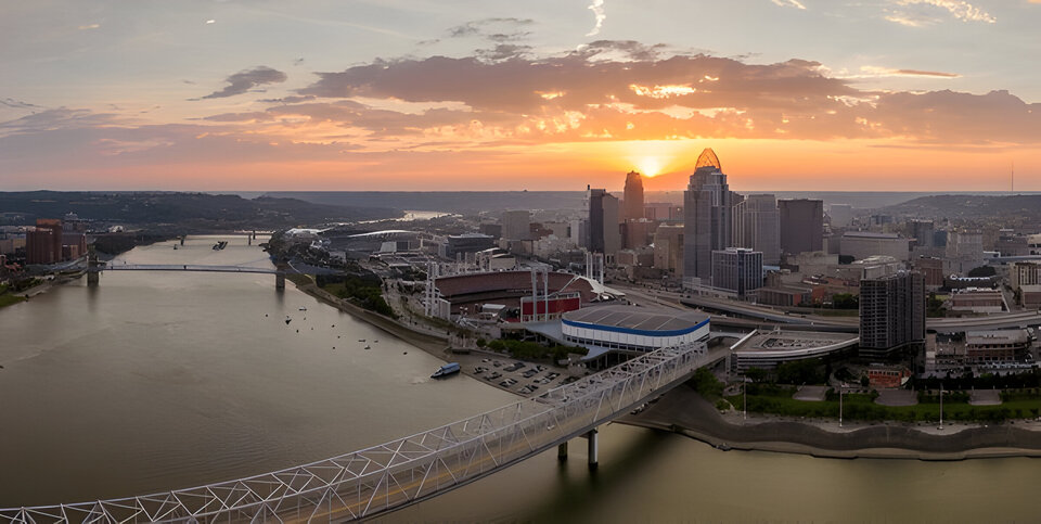 Highway traffic with driving cars on bridge in downtown district of Cincinnati city in Ohio, USA