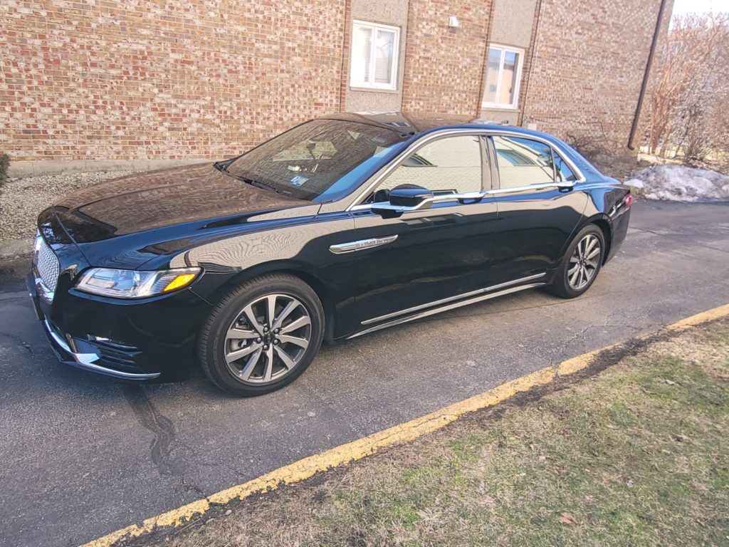 Our luxury black Lincoln Continental Sedan