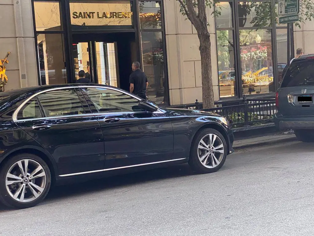 Black Luxury Sedan Parked on a roadside