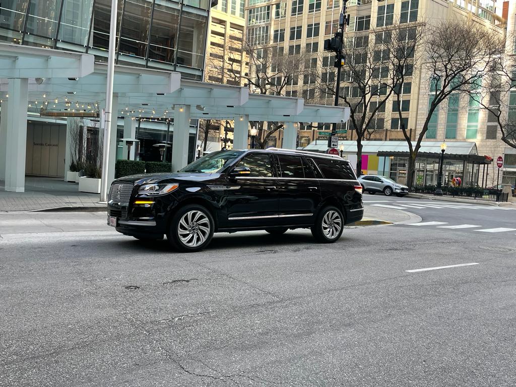 Black Luxury Suv on the Road