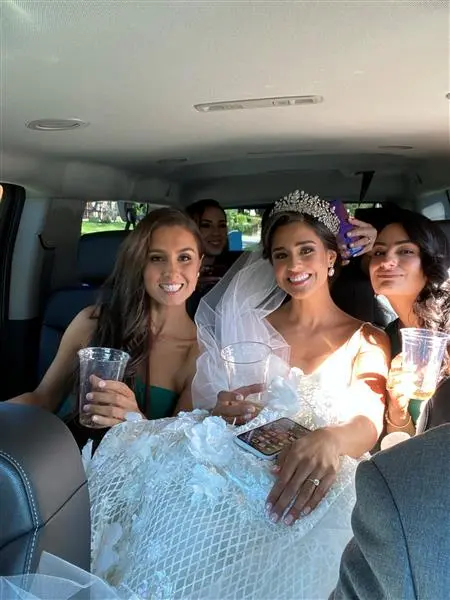 A bride with two girls in our luxury vehicles