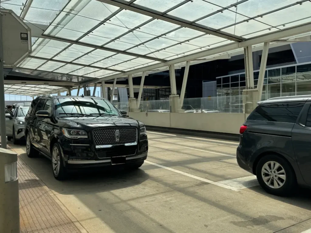 Luxury Black SUV in Airport